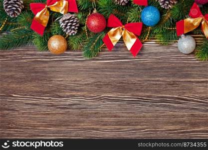 Christmas and New Year tree with decorations on brown wooden background. banner with copy space. Christmas and New Year background