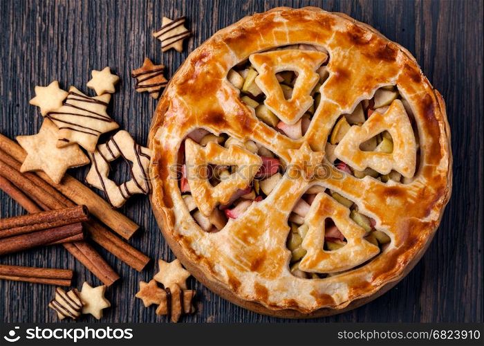 christmas apple pie on a table. apple pie