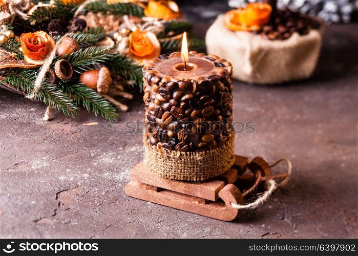 Christmas aromatic eco wreath with coffee candle. Christmas aromatic candle