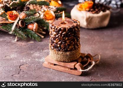 Christmas aromatic eco wreath with coffee candle. Christmas aromatic candle