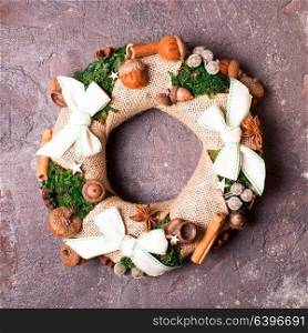 Christmas aromatic wreath. Christmas aromatic wreath with cinnamon anise stars and felted acorns