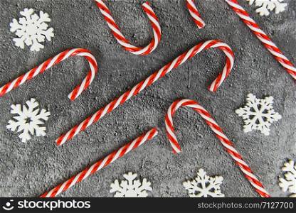 Christmas background / christmas decoration with snow and candy cane festive xmas winter and Happy New Year object holiday concept , top view
