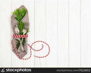 Christmas background. Festive table place setting decoration with christmas tree brunches