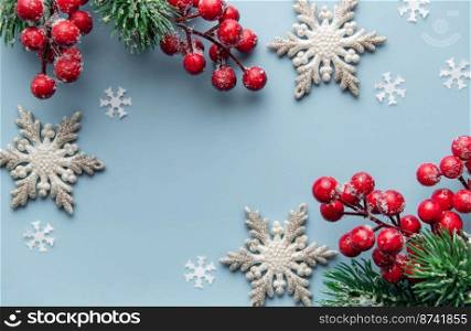 Christmas Background. Fir Tree Decorations  On  Light Vlue Background  With Copy Space. Christmas or New Year festive card