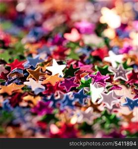 Christmas background from tiny stars closeup