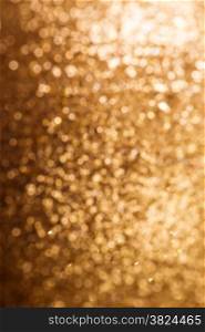 Christmas Background. Golden Holiday Abstract Glitter Defocused Background With Blinking Stars. Blurred Bokeh