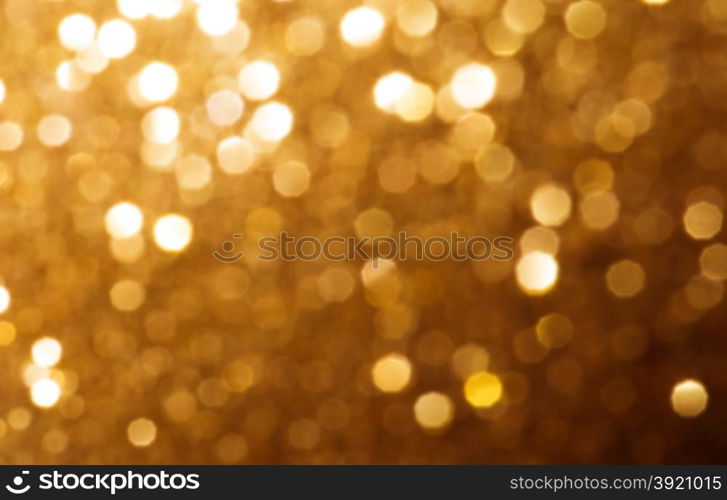 Christmas Background. Golden Holiday Abstract Glitter Defocused Background With Blinking Stars. Blurred Bokeh