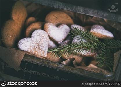 christmas background. homemade cakes for Valentine's Day - ginger cookies in the form of hearts in the old box