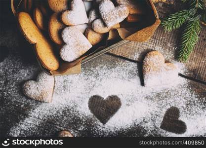christmas background. homemade cakes for Valentine's Day - ginger cookies in the form of hearts in the old box