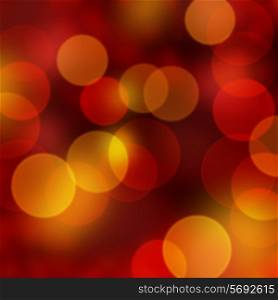 Christmas background of red and gold bokeh lights