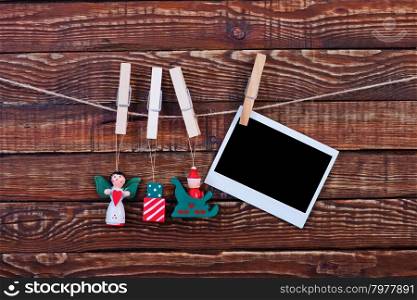 Christmas background.photo on wood background decorated with christmas clothespin