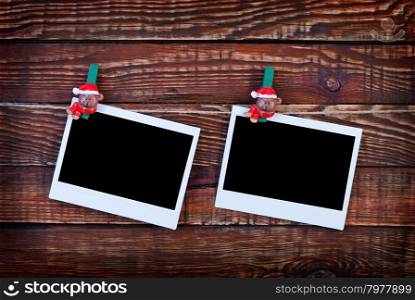 Christmas background.photo on wood background decorated with christmas clothespin