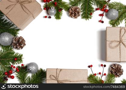 Christmas background with balls and decorations of holly berry, cones, gifts, balls on white. Christmas background with decorations