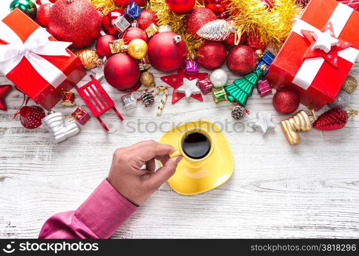 Christmas background with balls and decorations over wooden table