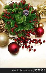 Christmas background with baubles, berries and gift