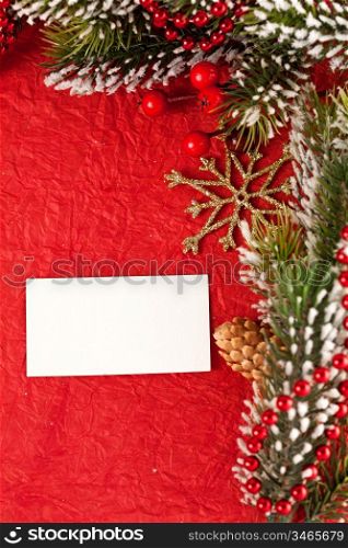 Christmas background with blank card and decorations. Copyspace for your text