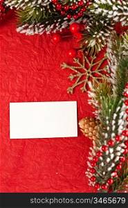 Christmas background with blank card and decorations. Copyspace for your text