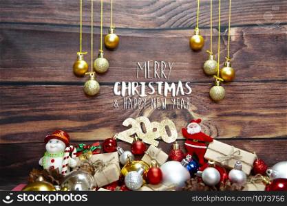 Christmas background with decorations, celebration balls on wooden board