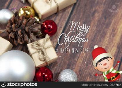 Christmas background with decorations, celebration balls on wooden board