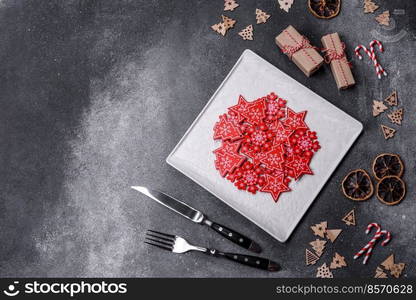 Christmas background with decorations. New Year symbol - decorative fir tree. Christmas composition made of christmas decoration on a dark background.