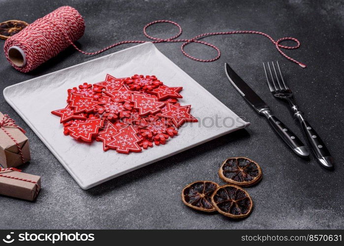 Christmas background with decorations. New Year symbol - decorative fir tree. Christmas composition made of christmas decoration on a dark background.