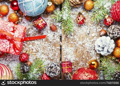 Christmas background with fir and decor.Winter composition on wooden background. Christmas holidays composition