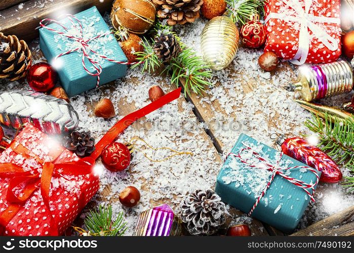 Christmas background with fir and decor.Winter composition on wooden background. Christmas holidays composition