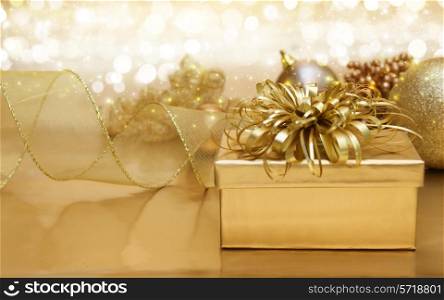 Christmas background with gold gift and decorations