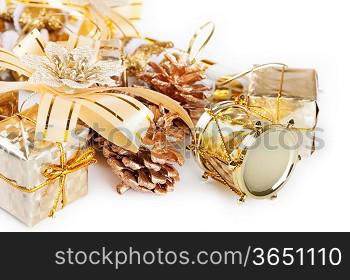 Christmas background with golden decorations and fir branch