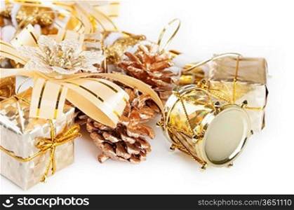 Christmas background with golden decorations and fir branch