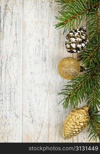 Christmas background with ornaments on branch