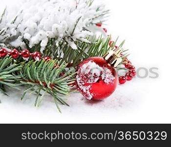 Christmas background with red decorations and fir branch
