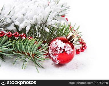 Christmas background with red decorations and fir branch