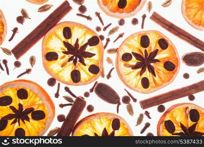 Christmas background with spices and dry orange&#39;s slices and coffee beans