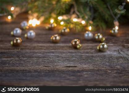 christmas background - wooden table with defocused lights and decorationd. christmas background with lights