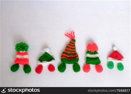 Christmas background, Xmas alphabet handmade by knitted, amazing ornament for noel as letter, gift, hat knit from red and green yarn, so amazing hand made product for winter holiday