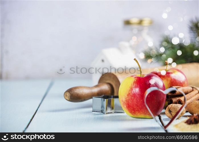 Christmas Baking background. Ingredients for cooking christmas baking on white wood background with copy space.