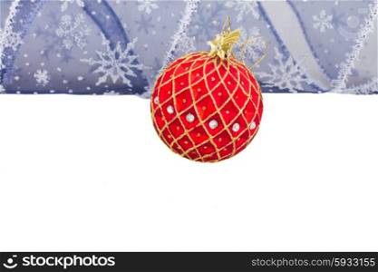 Christmas ball with ribbon. Christmas red ball with blue ribbon isolated on white background