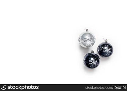 Christmas balls black and grey isolated on white, top view retro design, christmas decoration in a row background