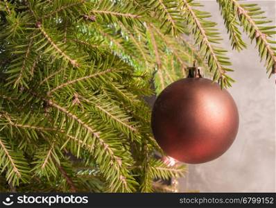 Christmas balls. Christmas festive background. Hanging on the branch of a Christmas ball. Christmas background