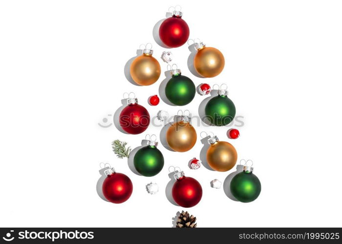 Christmas balls in the form of a Christmas tree. Christmas layout. top view, flat lay. Christmas balls in the form of a Christmas tree. Christmas layout