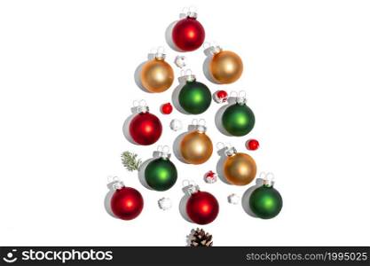 Christmas balls in the form of a Christmas tree. Christmas layout. top view, flat lay. Christmas balls in the form of a Christmas tree. Christmas layout