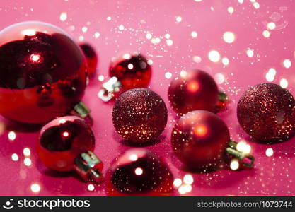 Christmas balls in winter setting,Winter holidays concept. Bokeh background