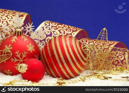 Christmas balls isolated on the blue background