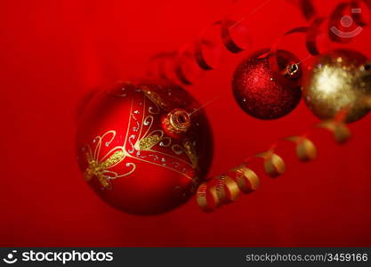 christmas balls on red satin background