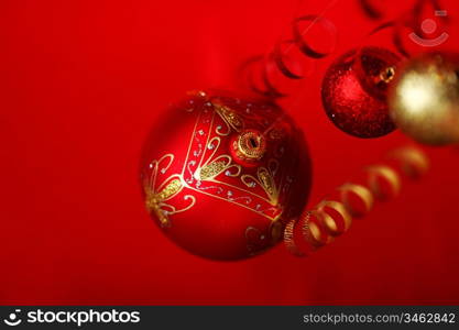 christmas balls on red satin background