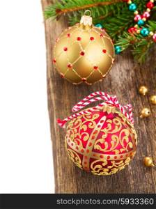 christmas balls on wooden background border. two christmas balls on wooden background border isolated on white