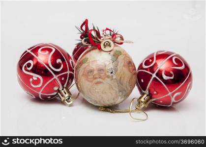 Christmas balls where santa is observed in one of them drawn