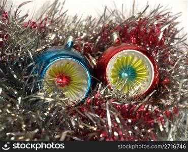 Christmas bauble and tinsel. Tinsel and baubles for Christmas tree decoration