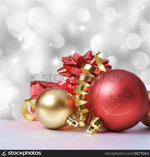 Christmas bauble background with bokeh lights and stars